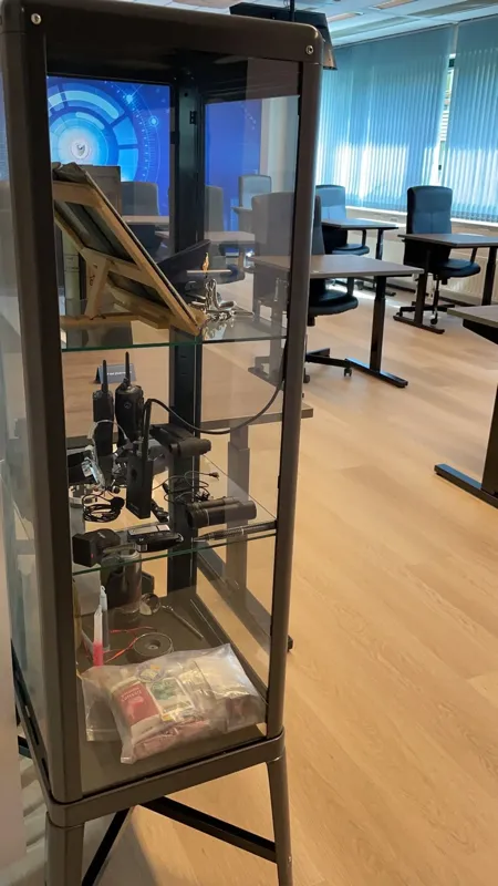 Display case with observation and recording equipment in an IACA classroom